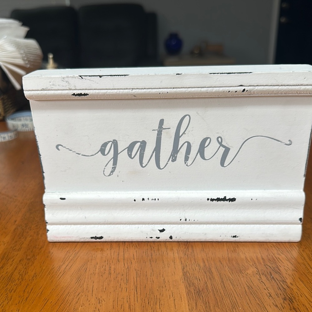 Quill to Paper wood sign. “Gather” written in gray cursive against white